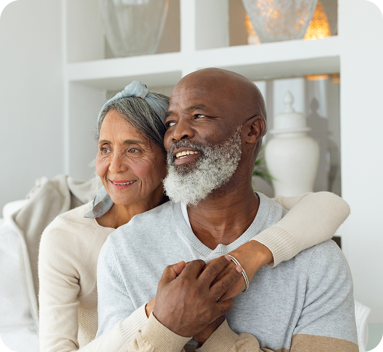 A man and woman looking at senior life agency Medicare Plans