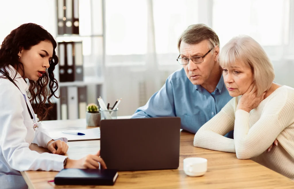 A doctor explaining Key Differences between Medicare Advantage vs Original Medicare