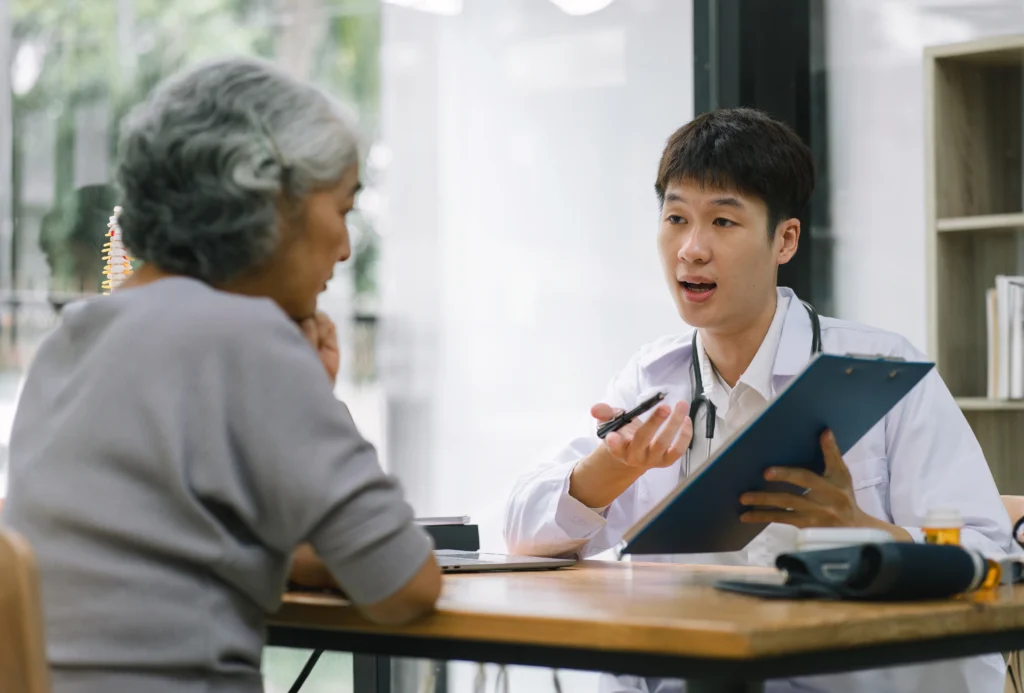 A medicare agent explaining what is medicare supplement to a senior