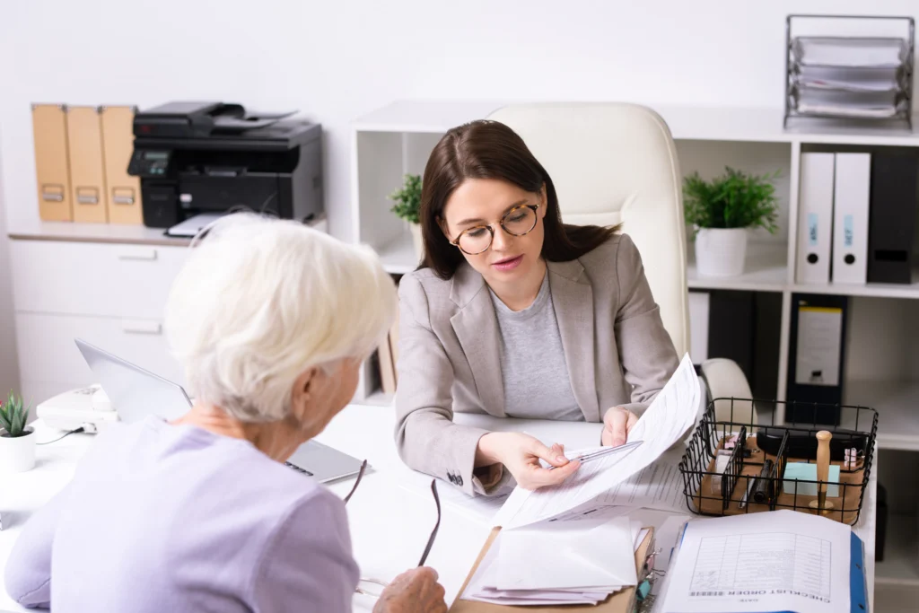 A medicare agent explaining to elder What she Should Review Each Year for medicare
